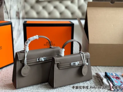 Hermès Mini Kelly2 crossbody bag with silk scarf Pegasus pendant
