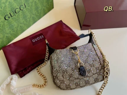 Gucci's new catwalk rhinestone Jackie chain crossbody bag comes in a box
